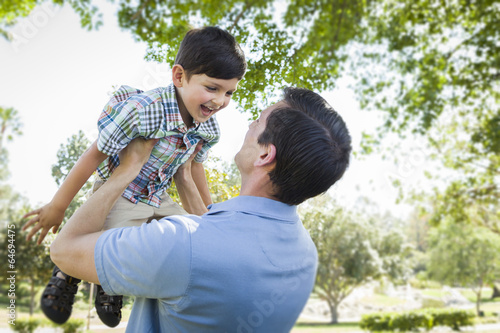 Father and Son Playing Toge...