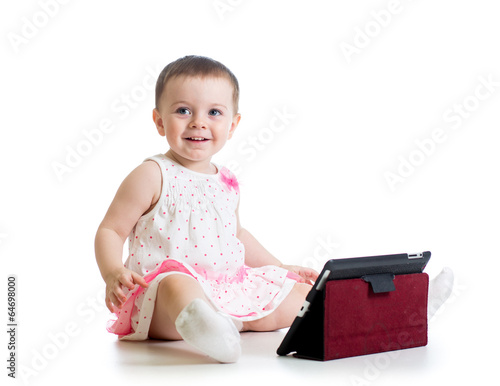 baby girl playing with a di...