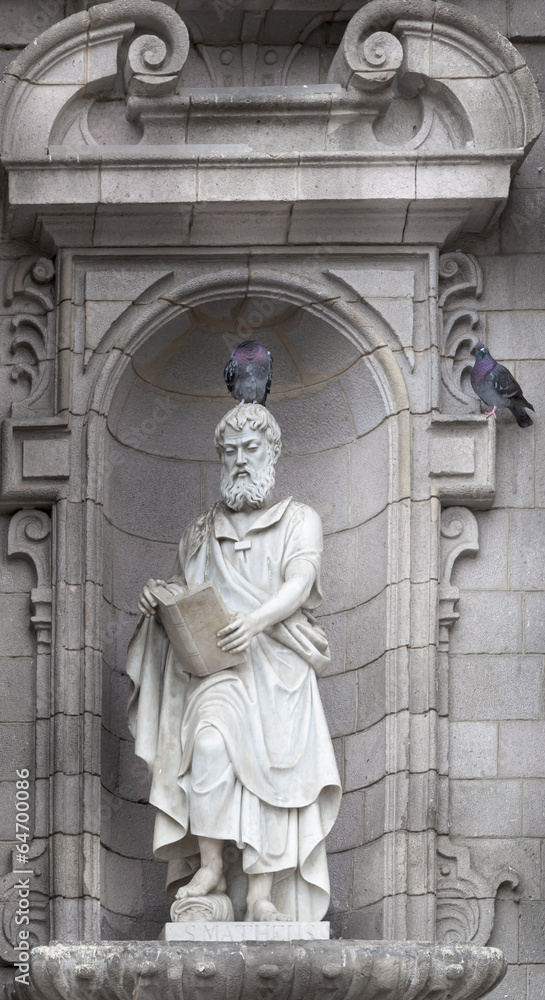 Sculpture of St. Matthew on the front facade of a cathedral, Cat