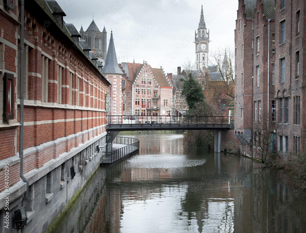 River with a clock tower in the background, River Lys, Ghent, Be