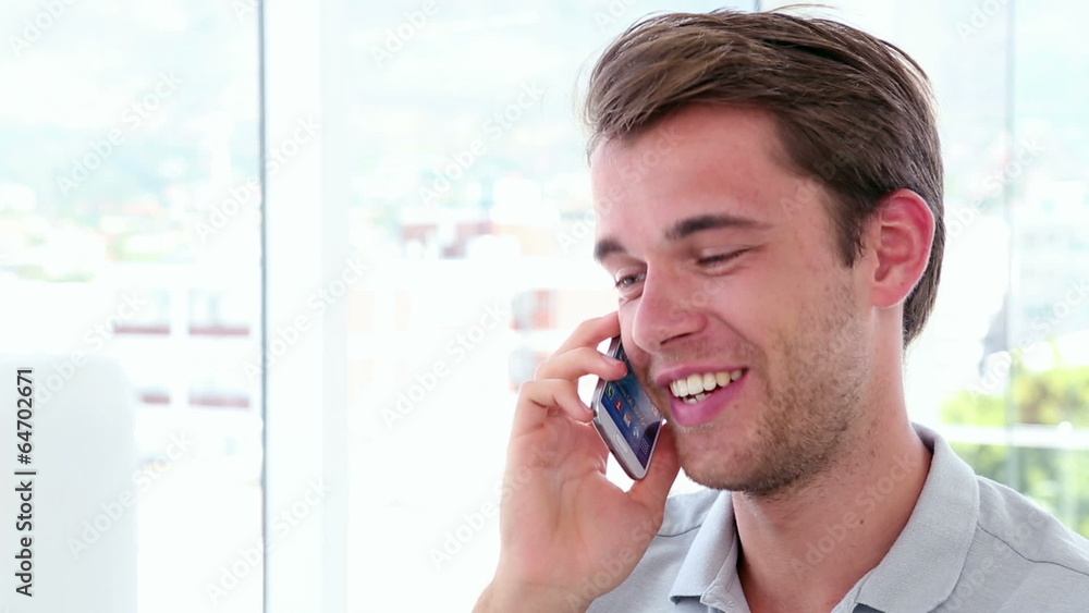 Casual businessman talking on the phone Casual businessman talking on the phone