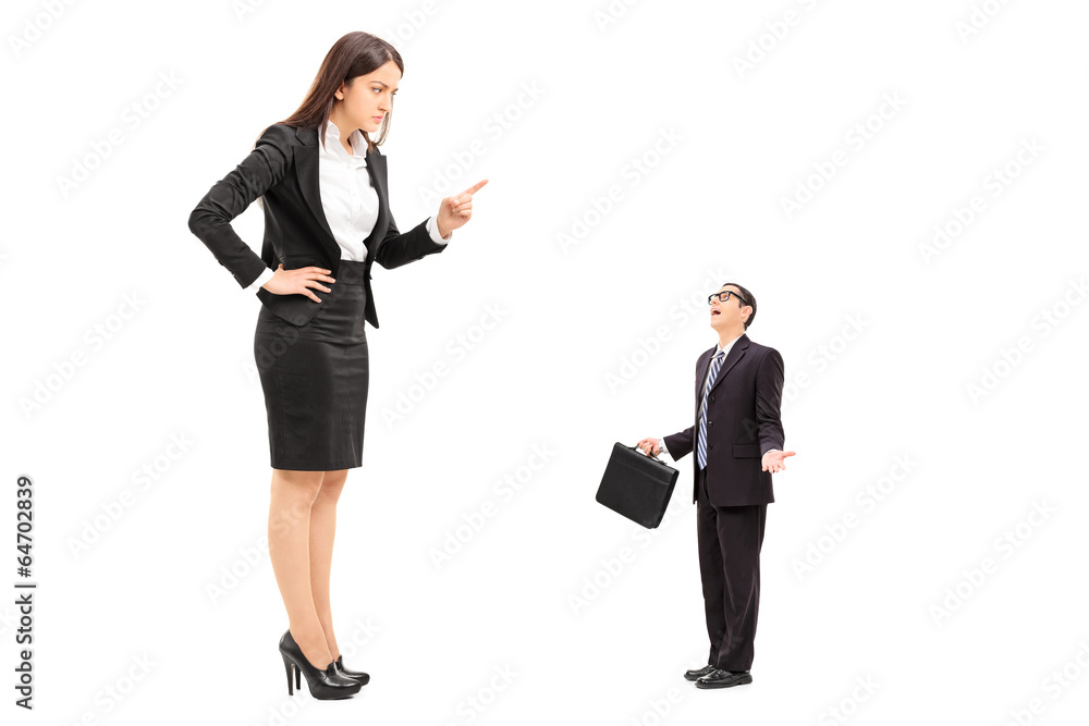 Giant woman threatening a tiny businessman Giant woman threatening a tiny businessman
