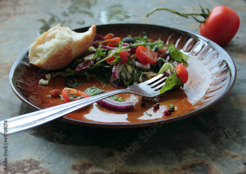 Salad with fresh vegetables with herbs and white bread