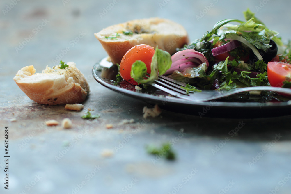 Healthy salad made of fresh vegetables with crunchy baguette Healthy salad made of fresh vegetables with crunchy baguette