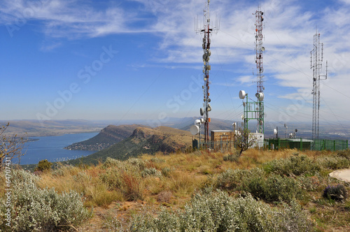 Telecommunication towers in African landscape photo