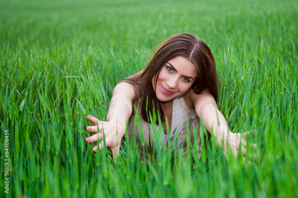 Healthy Smiling Girl in Green Grass. Healthy Smiling Girl in Green Grass.