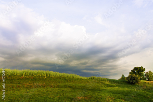 Stormy sky rain clouds countryside. © Justinb