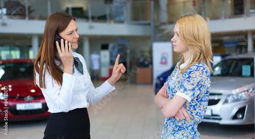 Angry customer. Two women photo