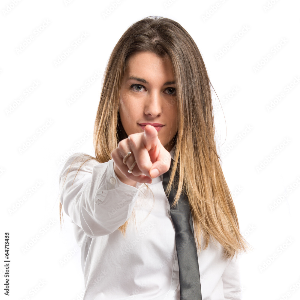 Businesswoman pointing over white background Businesswoman pointing over white background