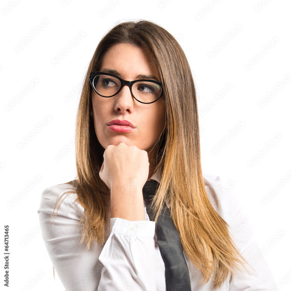 Cute businesswoman thinking an idea Cute businesswoman thinking an idea