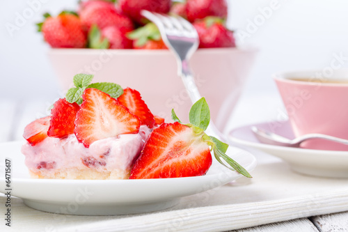 Strawberry cake with coffee or tea.