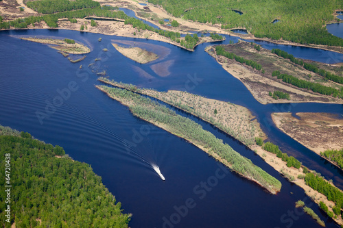 Top view of forest river with boat © Vladimir Melnikov