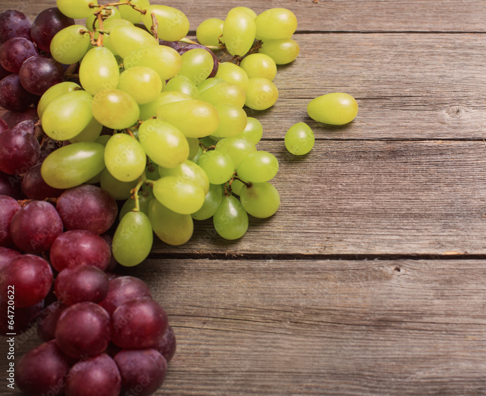 Grapes on a wooden table Grapes on a wooden table