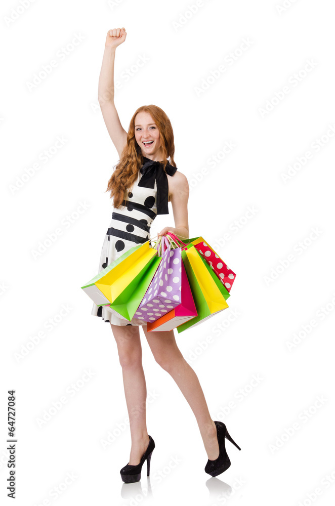 Young woman with shopping bags on white Young woman with shopping bags on white