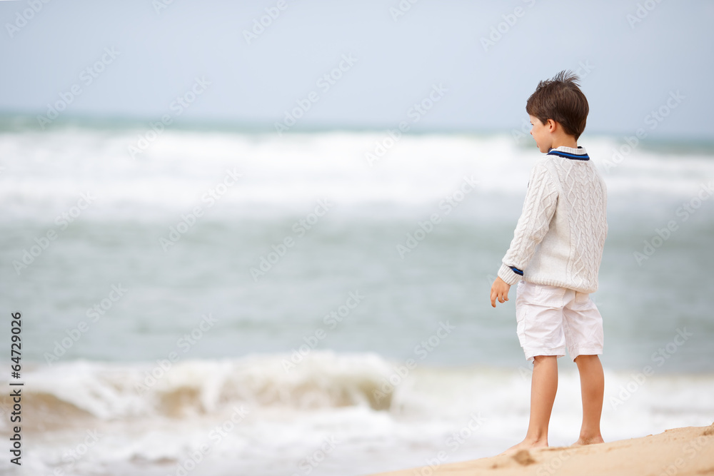 Six years old boy playing on atlantic beach Six years old boy playing on atlantic beach