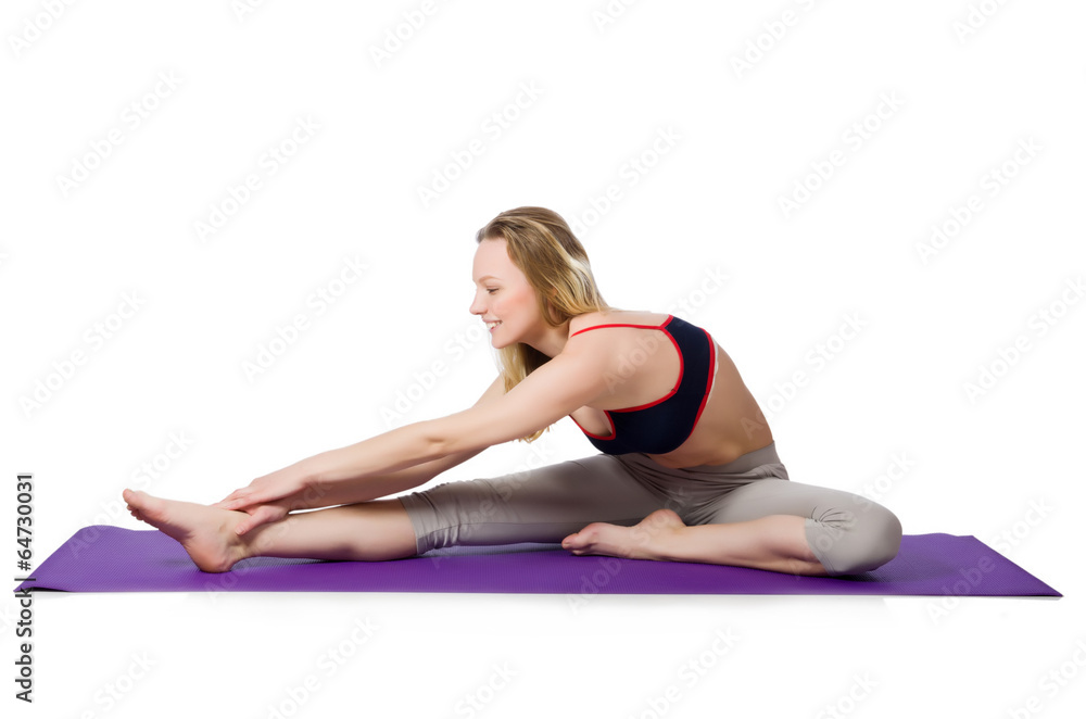 Young female doing exercises on white Young female doing exercises on white
