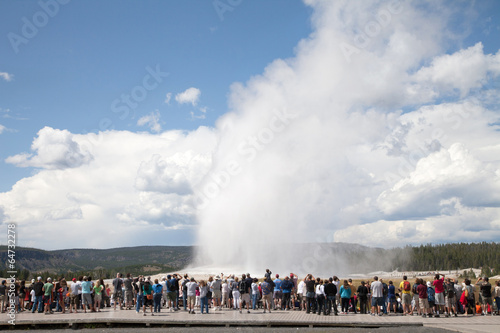 Yellowstone National Park Tourists watching Old Faithful