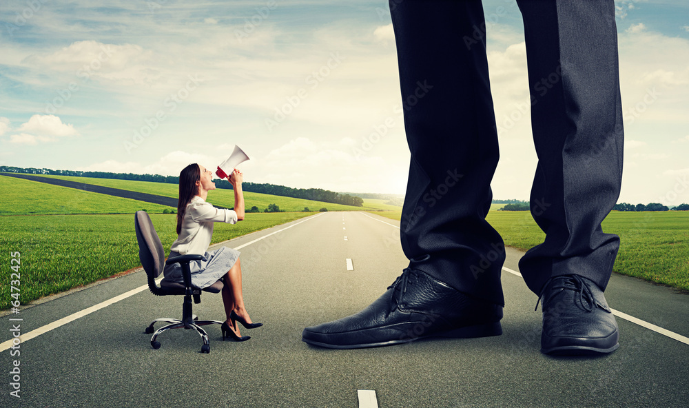 Fototapeta premium angry woman screaming at big boss