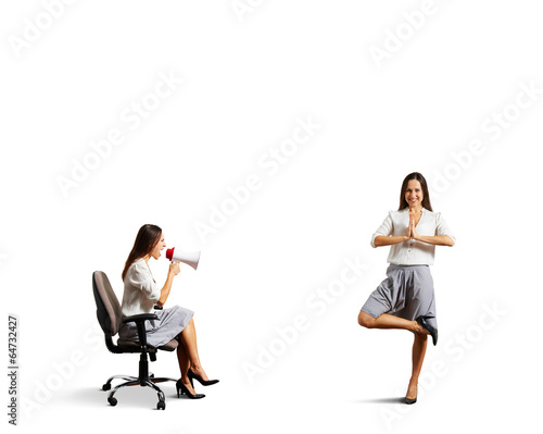 angry woman screaming at calm woman