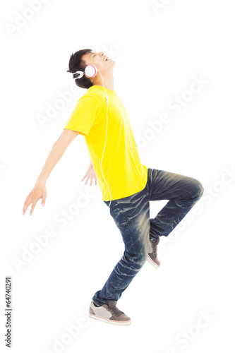 happy man dancing while listening music