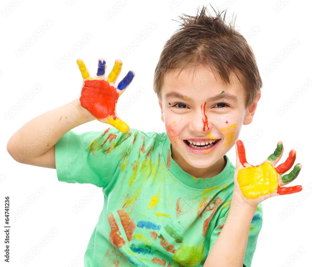 Portrait of a cute boy playing with paints Portrait of a cute boy playing with paints