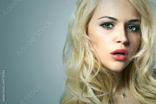 Beauty young woman.beautiful blond girl with green eyes