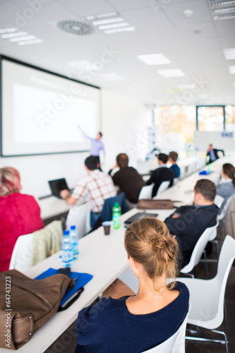 People listening to a presentation