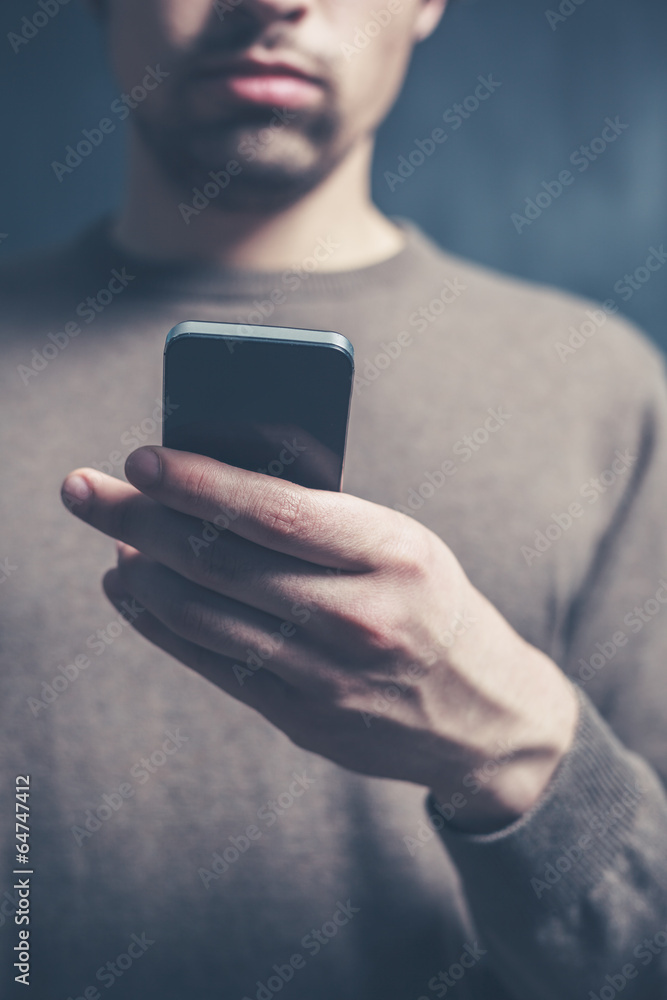 Young man using smart phone Young man using smart phone