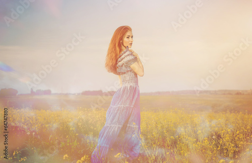 lady at meadow sunset