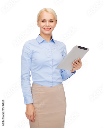 smiling woman looking at tablet pc computer