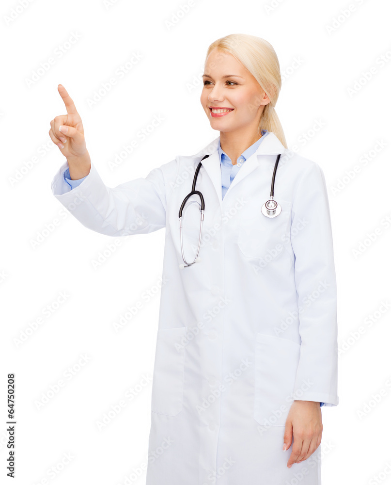 smiling female doctor pointing to something smiling female doctor pointing to something