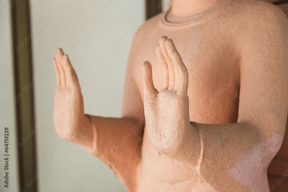 Fototapeta premium Hands of Buddha statue