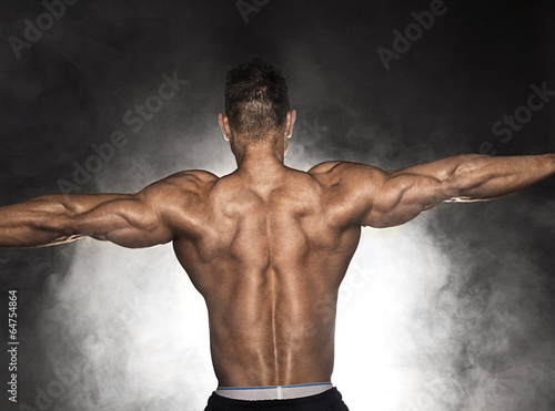 Rear view of bodybuilder