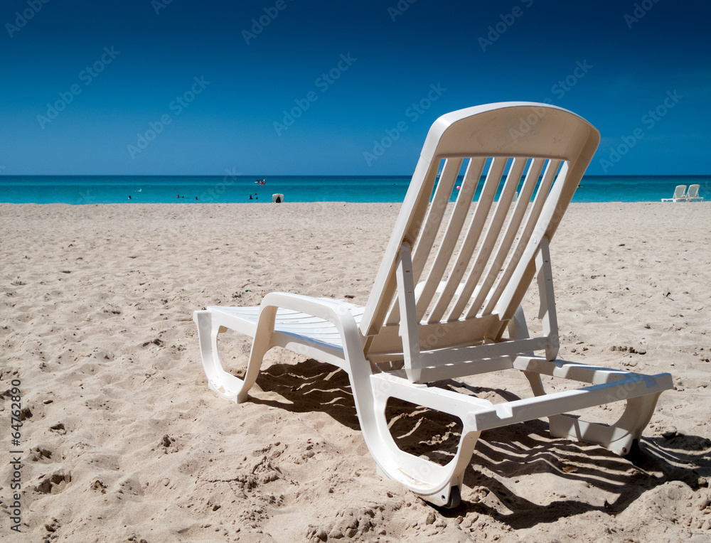 Reclining chair on the beach, Havana, Cuba Reclining chair on the beach, Havana, Cuba