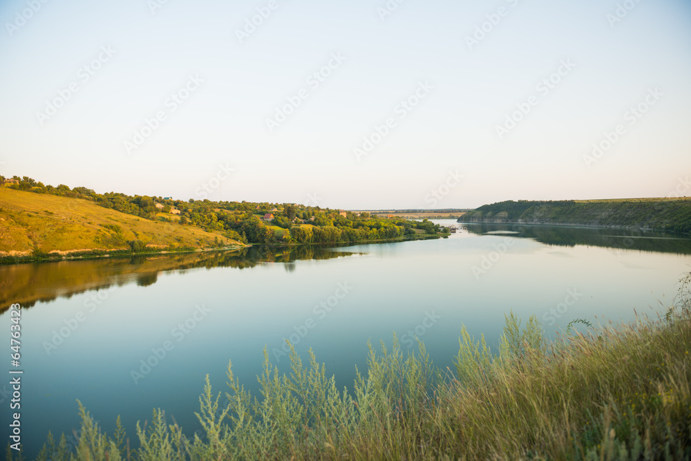 wide river at rural sunset