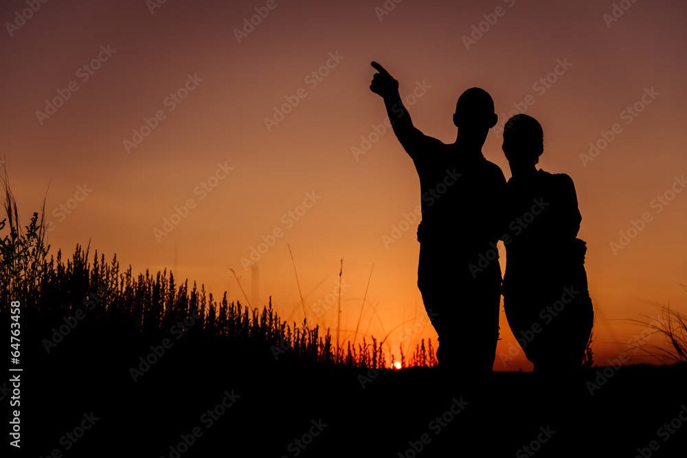 sunset couple silhouettes