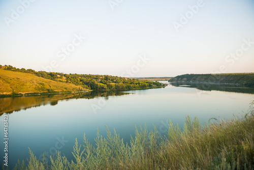wide river at rural sunset