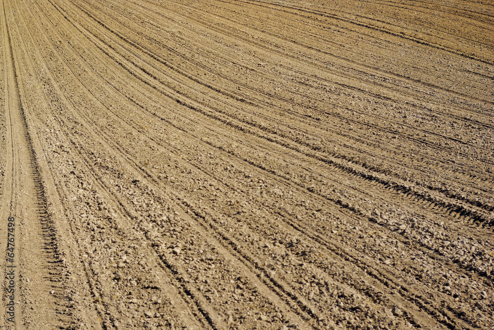 Plowed land on the field during agricultural work Plowed land on the field during agricultural work