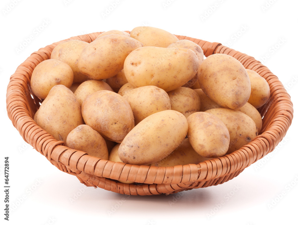 Potato tuber in wicker basket isolated on white background Potato tuber in wicker basket isolated on white background