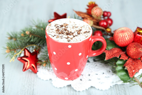 Hot chocolate with cream in color mug,