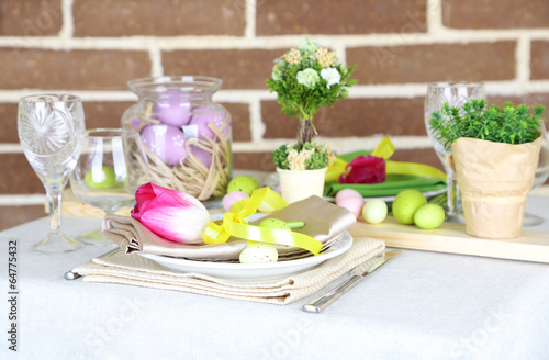 Beautiful holiday Easter table setting, on bright background