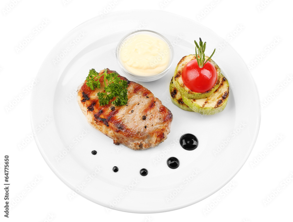 Grilled steak and grilled vegetables on plate, isolated on Grilled steak and grilled vegetables on plate, isolated on