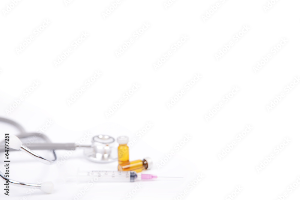 White background of syringe and medicine bottles. White background of syringe and medicine bottles.