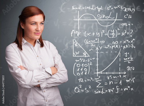 Beautiful school girl thinking about complex mathematical signs