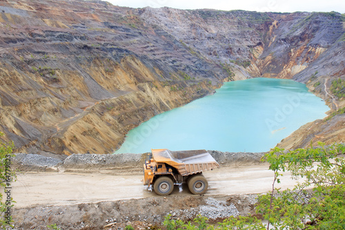 Truck in open pit photo