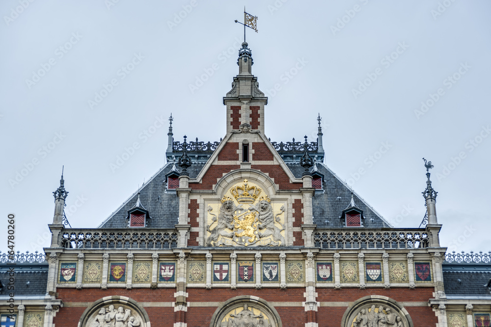Naklejka premium Amsterdam central railway station in Netherlands.