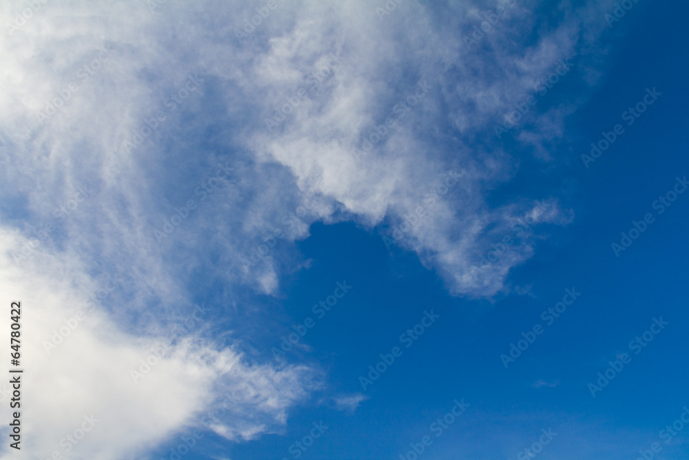 Background with white clouds on a beautiful blue sky