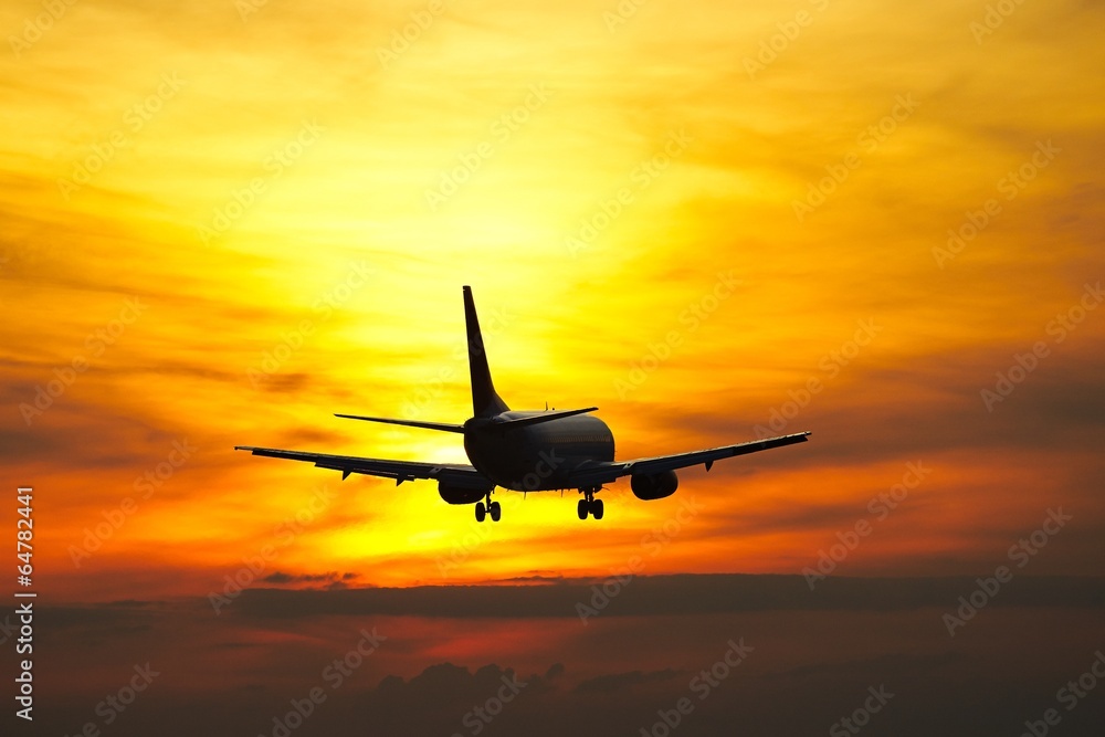 Airplane at the sunset Airplane at the sunset
