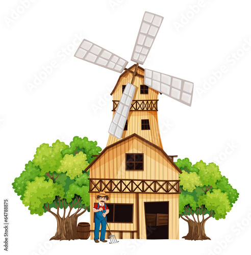A farmer in front of the barnhouse
