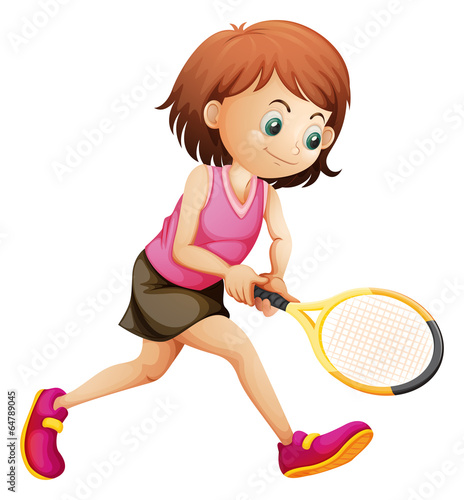 A cute little girl playing tennis